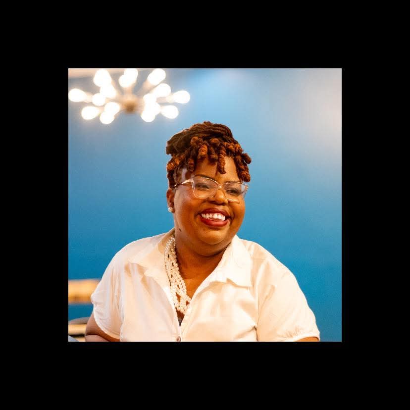 Brandize speaking at a conference